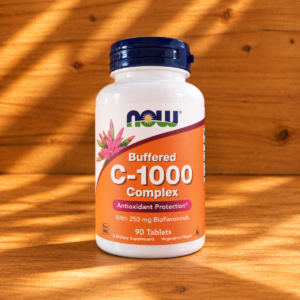Buffered C-1000 Supplement Bottle in Warm Sunlight